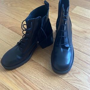 Womens black leather boots. Made in Spain. Never been worn size 9(us)